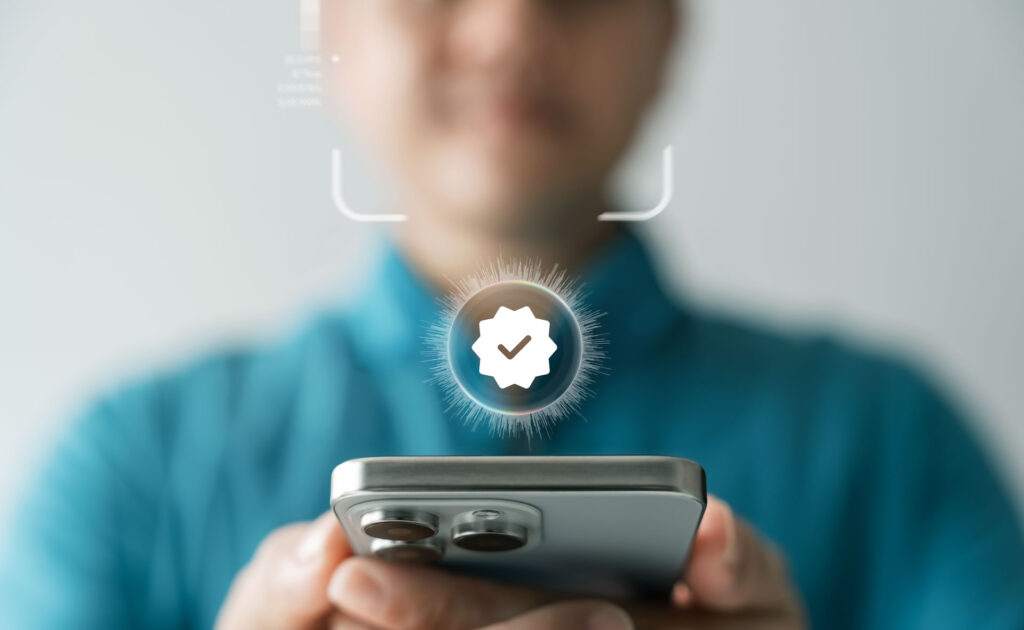 Person signing into their phone with their face