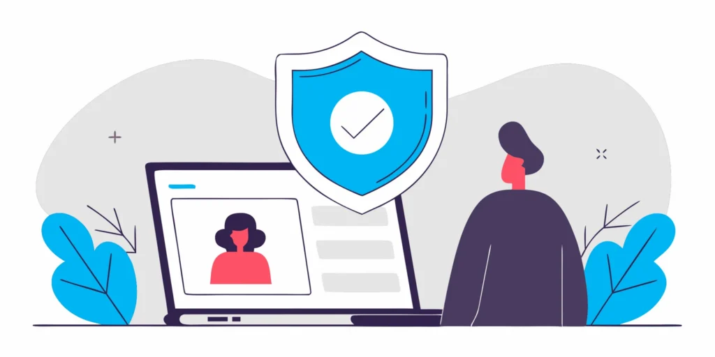 A person using a laptop with a digital identity verification interface on screen, glowing shield icon representing trust and security